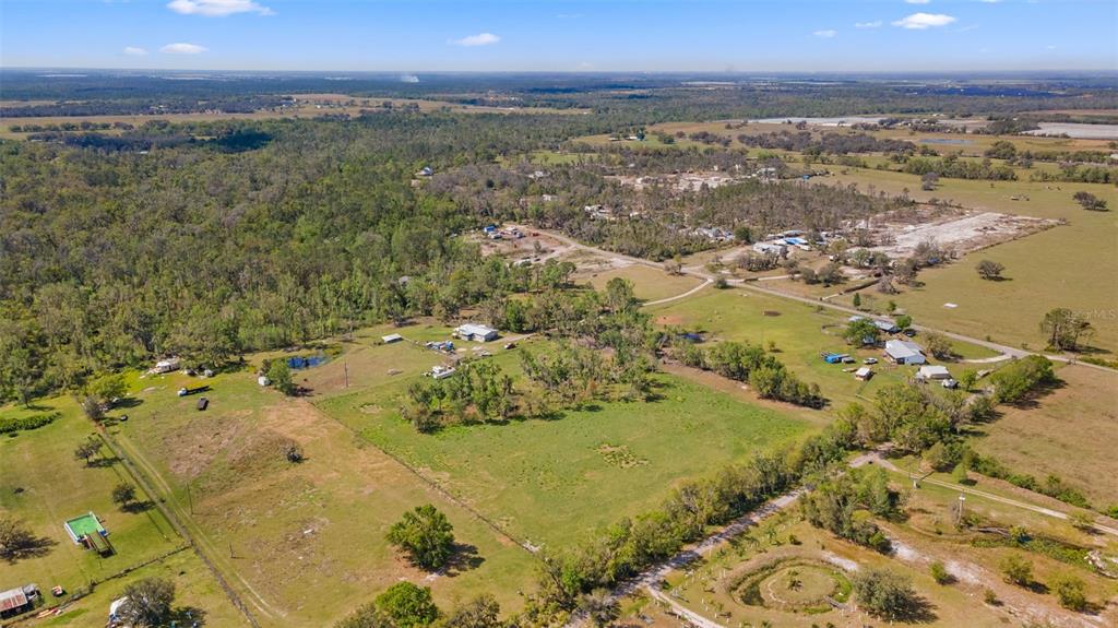 11041 Revell Road Parrish, FL 34219 - Photo 7 of 11 a view of lake and mountain