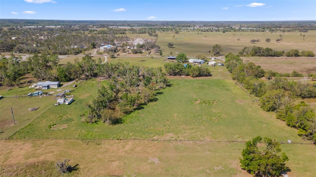 11041 Revell Road Parrish, FL 34219 - Photo 9 of 11 a view of lake with mountain