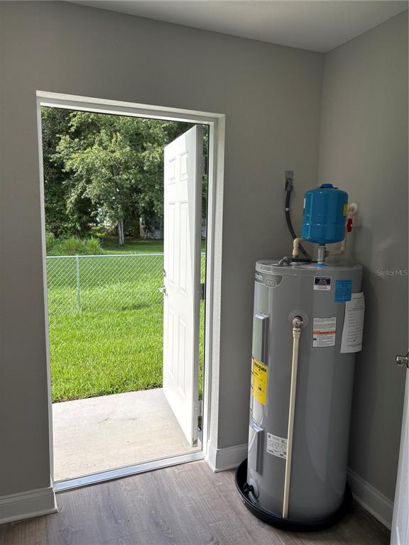 526 2nd Street Southwest Fort Meade, FL 33841 - Photo 9 of 21 a view of open door and garden
