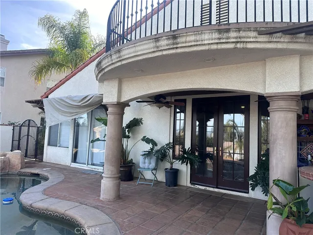 a view of a chairs and tables in the patio