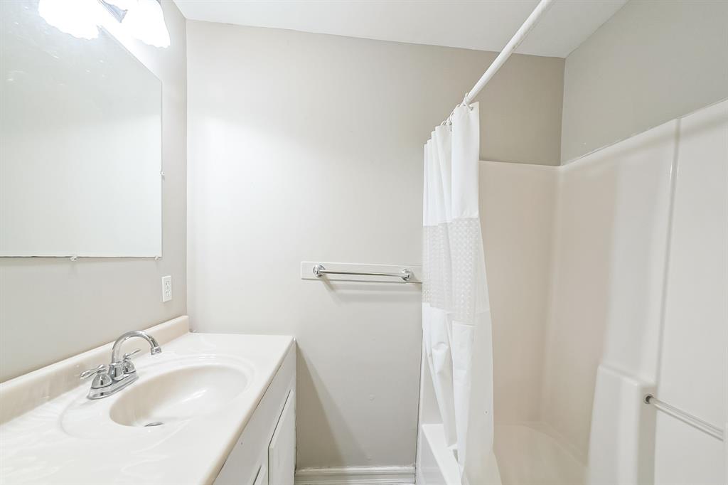 2861 Fm 727 Jefferson, TX 75657 - Photo 22 of 35 a bathroom with a sink and a mirror