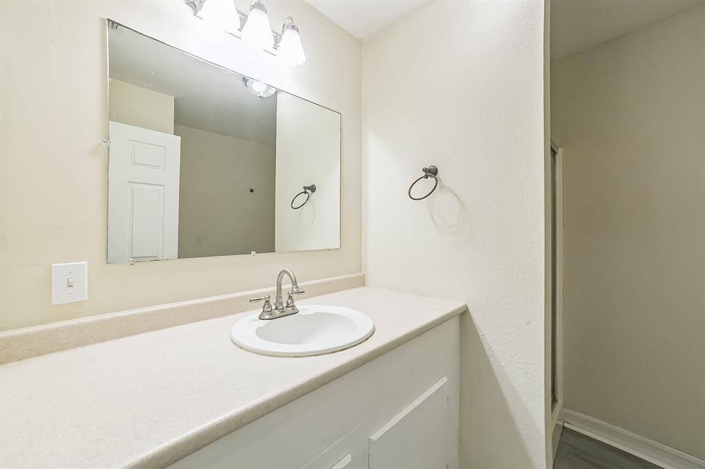 2861 Fm 727 Jefferson, TX 75657 - Photo 26 of 35 a bathroom with a sink and a mirror