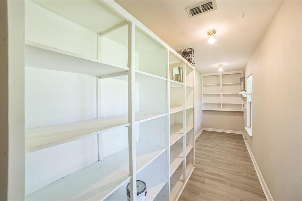2861 Fm 727 Jefferson, TX 75657 - Photo 30 of 35 a view of walk in closet with empty racks