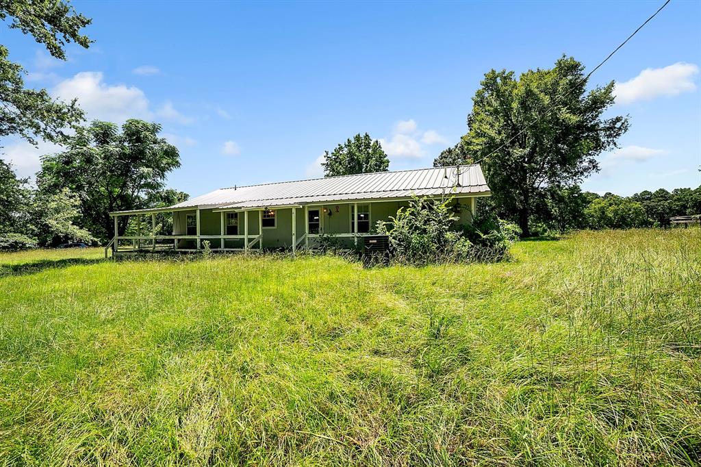 2861 Fm 727 Jefferson, TX 75657 - Photo 31 of 35 a view of a house with a garden