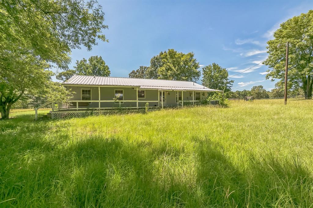 2861 Fm 727 Jefferson, TX 75657 - Photo 33 of 35 a view of a house with yard and lake view