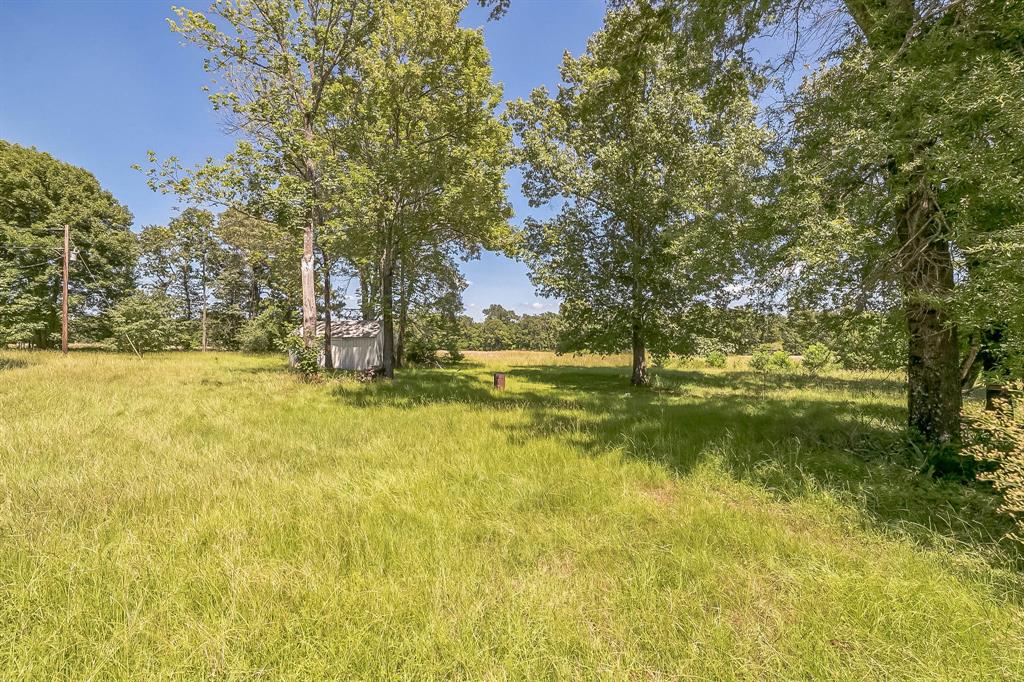 2861 Fm 727 Jefferson, TX 75657 - Photo 35 of 35 a view of yard with swimming pool and green space