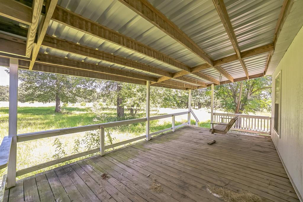 2861 Fm 727 Jefferson, TX 75657 - Photo 5 of 35 a view of porch with wooden floor