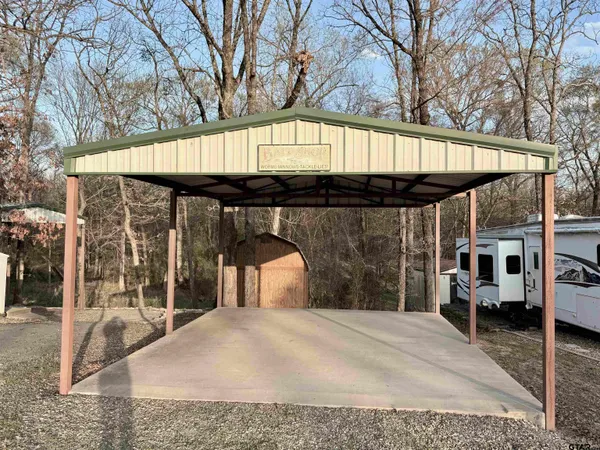 a view of a yard with trees