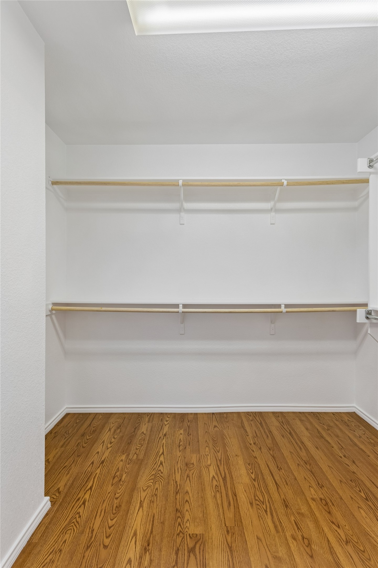 2372 Paradise Ridge Drive Round Rock, TX 78665 - Photo 20 of 40 Ample hanging space and durable flooring define this well-appointed closet.