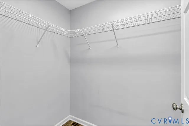 a bathroom with a toilet and a bathtub