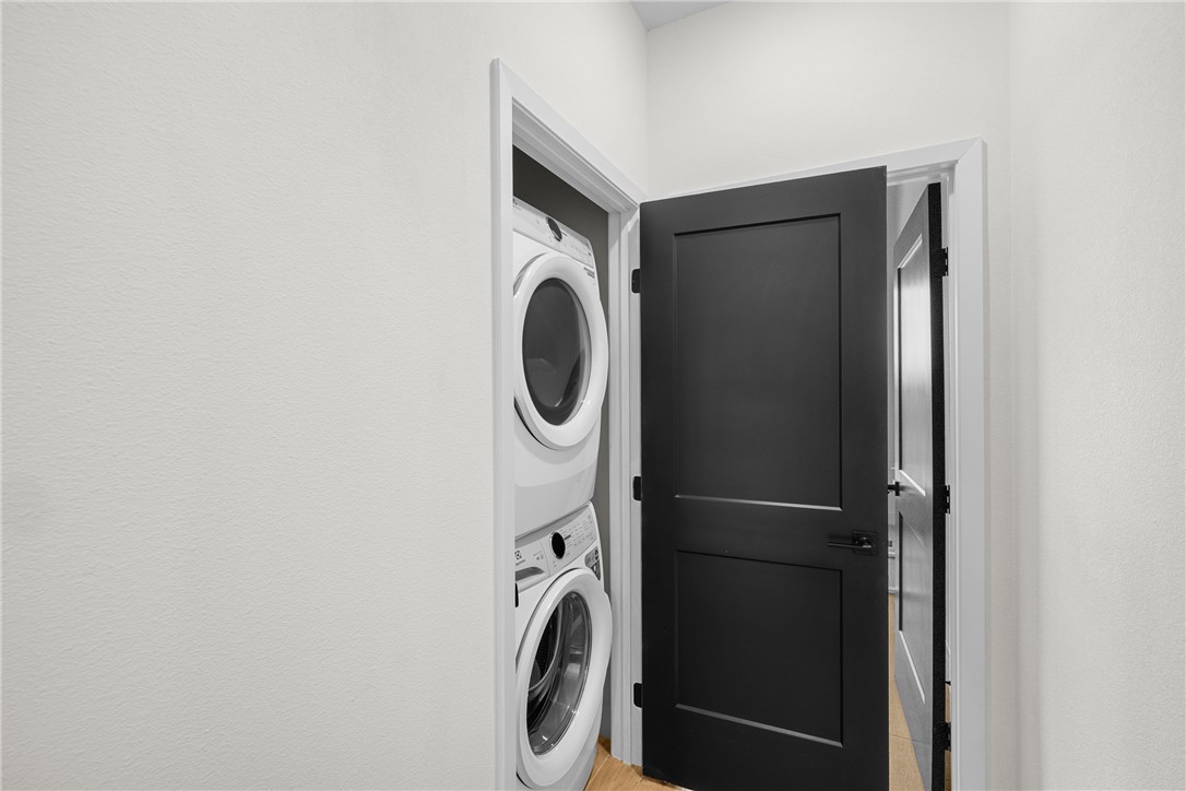 2539 East Villa Maria Road, Unit D Bryan, TX 77802 - Photo 25 of 37 a utility room with dryer and washer