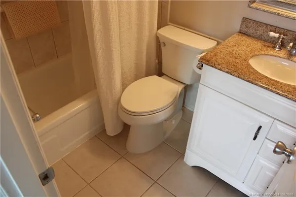 a bathroom with a sink and toilet