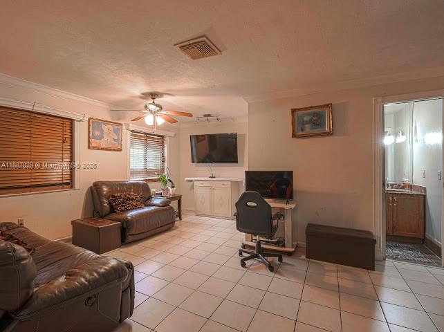 14220 Southwest 109th Street Miami, FL 33186 - Photo 15 of 30 a livingroom with workspace and a couch