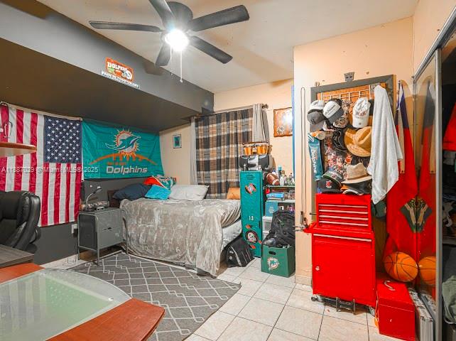 14220 Southwest 109th Street Miami, FL 33186 - Photo 16 of 30 a living room with patio furniture and a potted plant