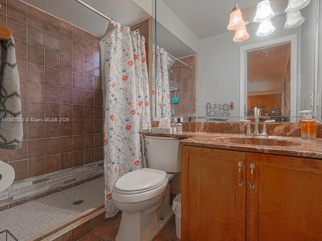 14220 Southwest 109th Street Miami, FL 33186 - Photo 17 of 30 a bathroom with a sink a toilet a mirror and shower