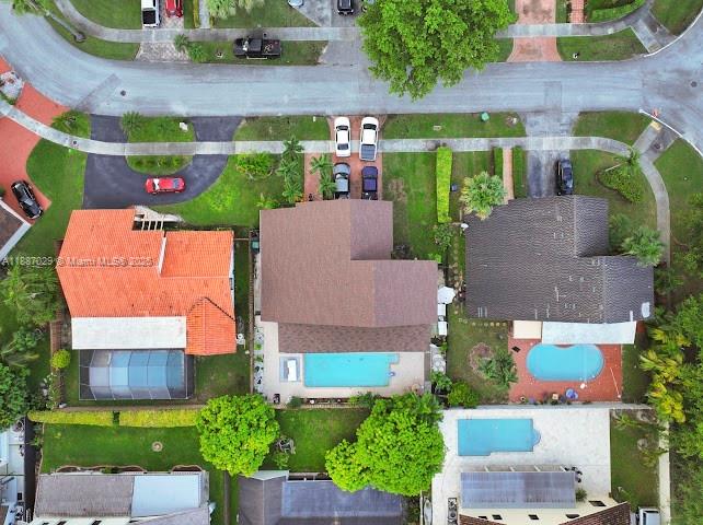 14220 Southwest 109th Street Miami, FL 33186 - Photo 3 of 30 an aerial view of a house with a yard and a fountain