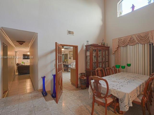 14220 Southwest 109th Street Miami, FL 33186 - Photo 8 of 30 a view of a dinning room and livingroom with furniture