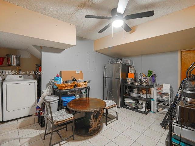 14220 Southwest 109th Street Miami, FL 33186 - Photo 10 of 30 a dining room with furniture and a flat screen tv