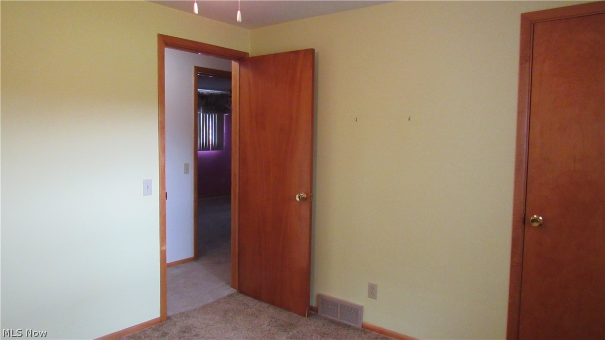 6841 Navarre Road Southwest Massillon, OH 44646 - Photo 27 of 50 Another view of bedroom into Hall.