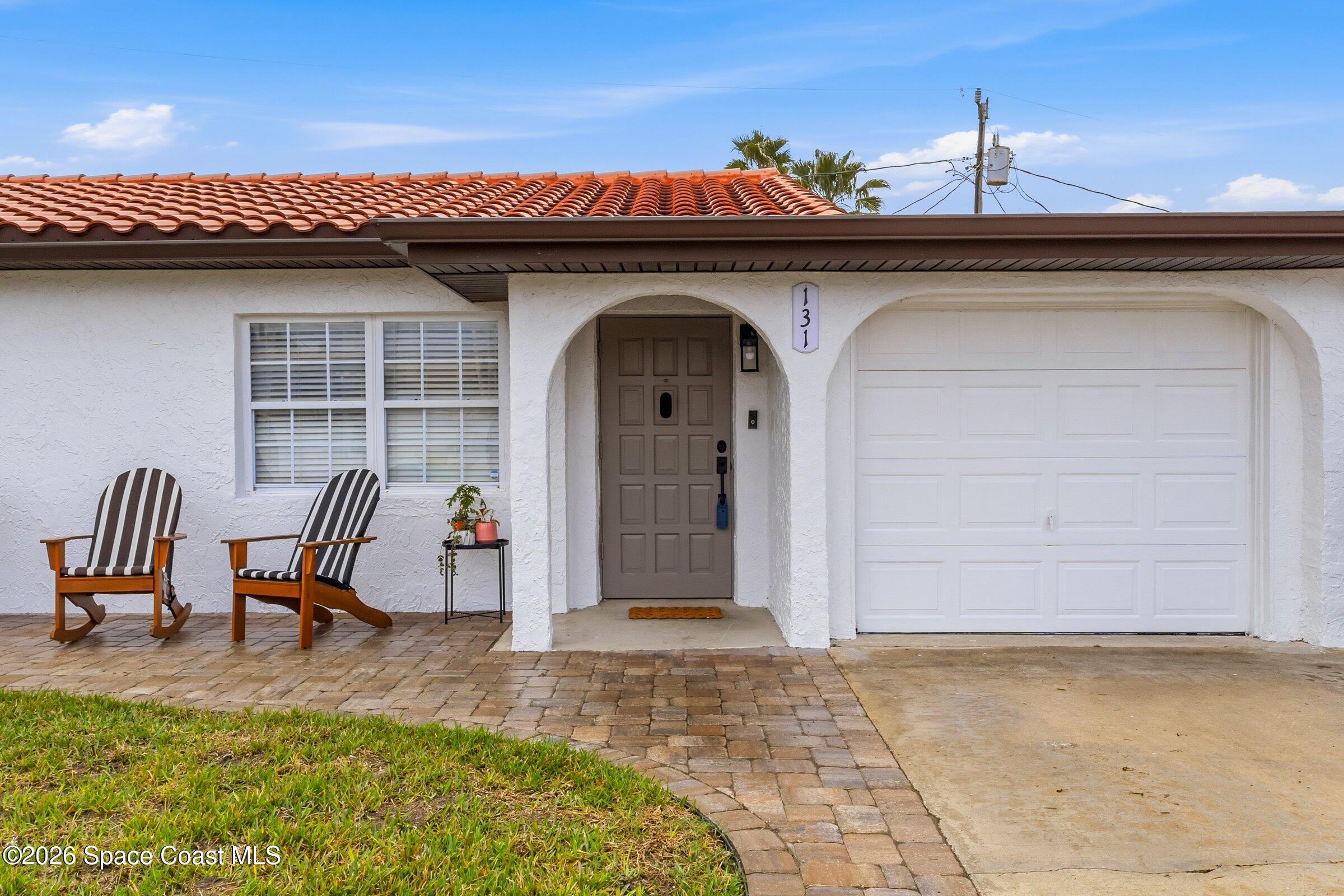 131 Delmar Street Indialantic, FL 32903 - Photo 4 of 29 a view of outdoor space yard and porch
