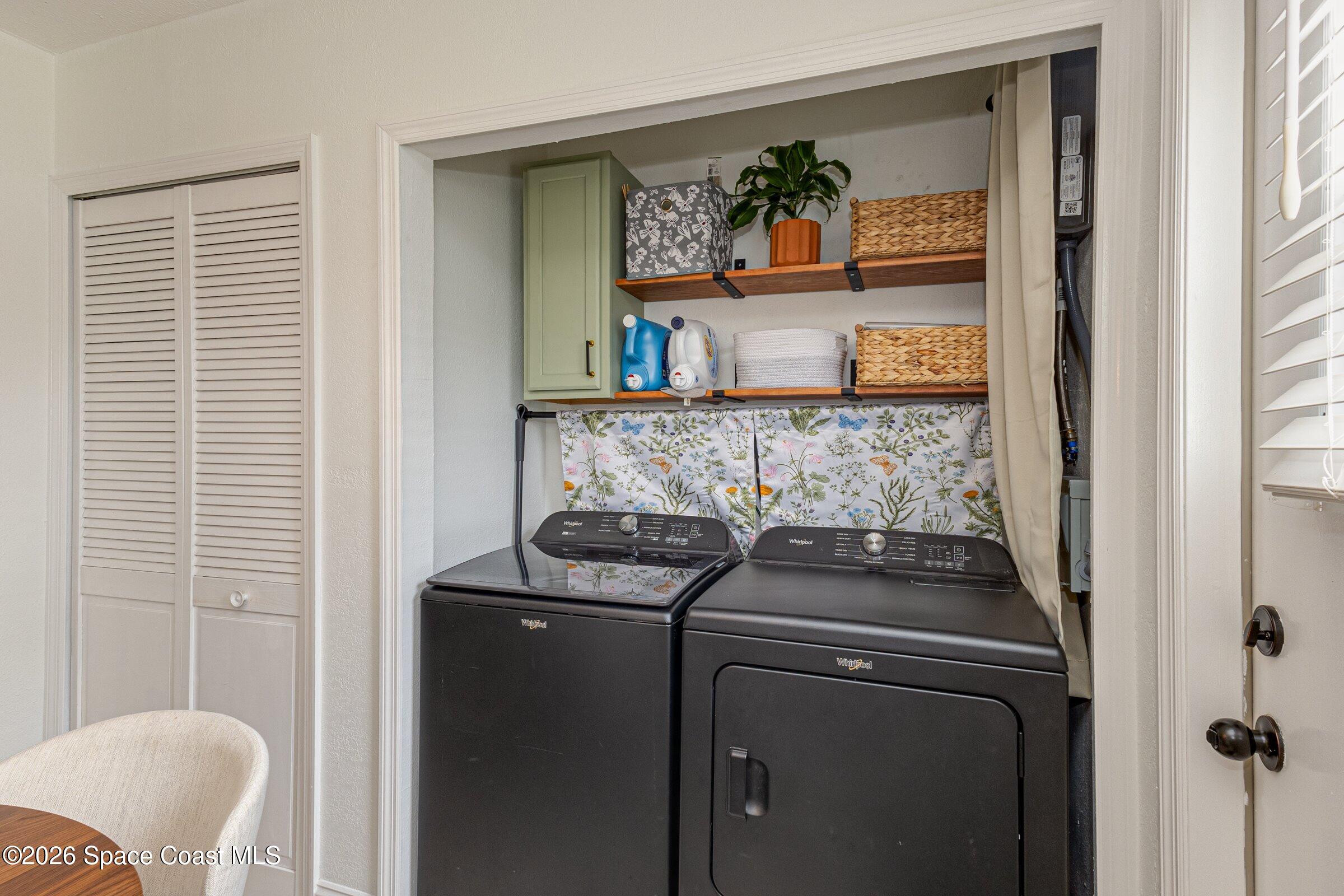 131 Delmar Street Indialantic, FL 32903 - Photo 10 of 29 a utility room with dryer and washer