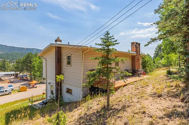 a backyard of a house with lots of green space