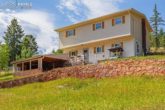 front view of a house with a big yard