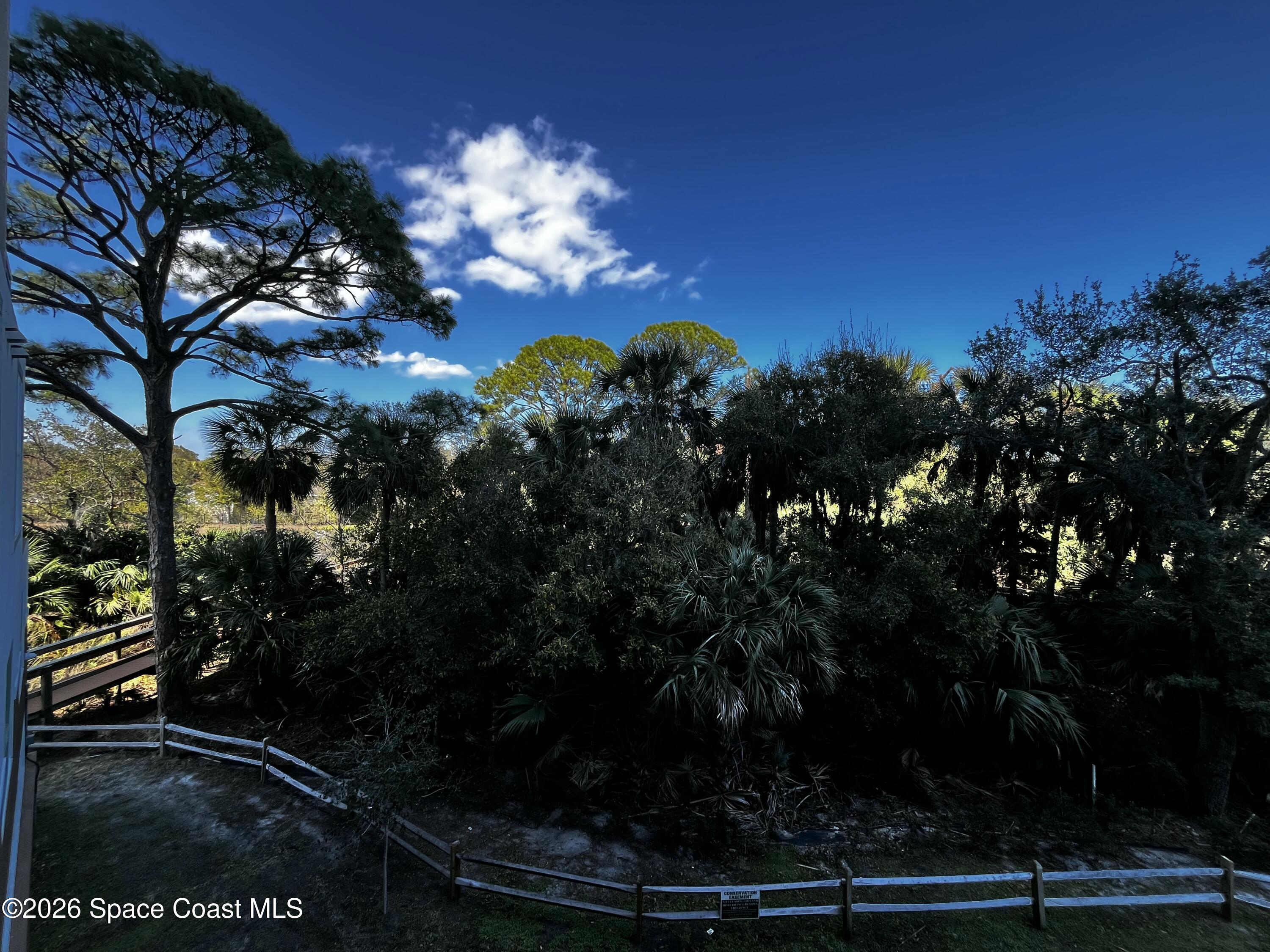 735 Pilot Lane, Unit 503 Merritt Island, FL 32952 - Photo 12 of 26 a view of a yard