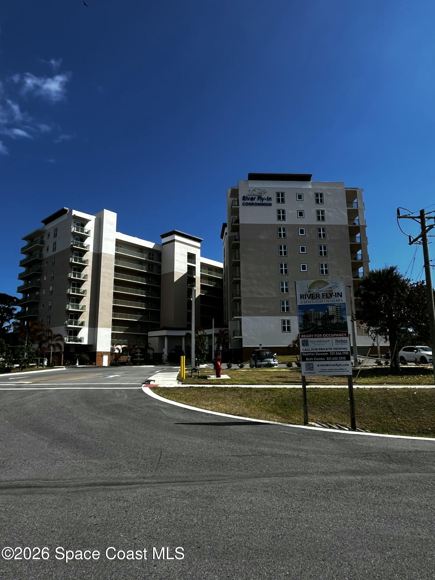 735 Pilot Lane, Unit 503 Merritt Island, FL 32952 - Photo 21 of 26 a view of a building with a street