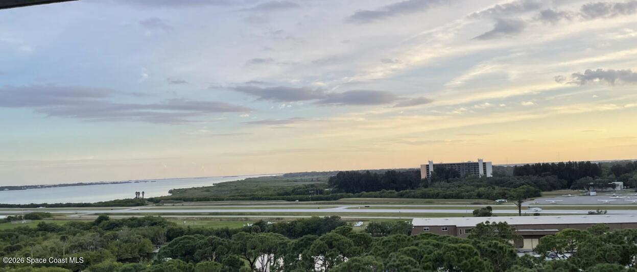 735 Pilot Lane, Unit 503 Merritt Island, FL 32952 - Photo 10 of 26 a view of a town with big trees