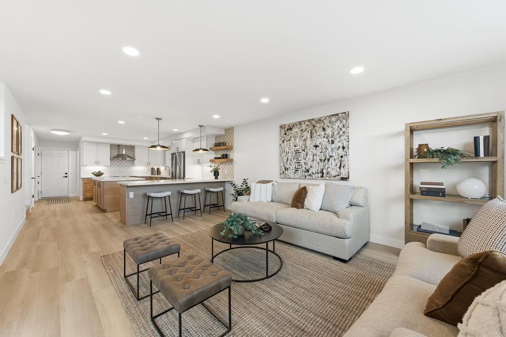 370 Burning Tree Court Half Moon Bay, CA 94019 - Photo 12 of 47 a living room with furniture and kitchen view