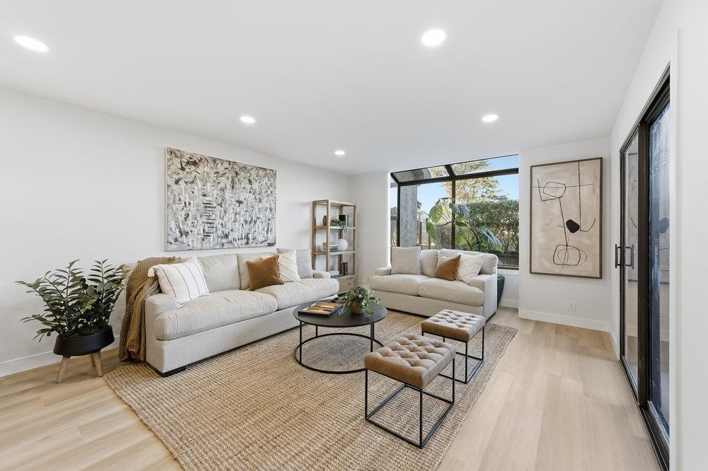 370 Burning Tree Court Half Moon Bay, CA 94019 - Photo 13 of 47 a living room with furniture and a large window