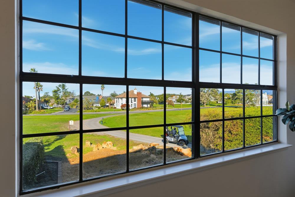 370 Burning Tree Court Half Moon Bay, CA 94019 - Photo 23 of 47 a view of an outdoor space with a floor to ceiling window