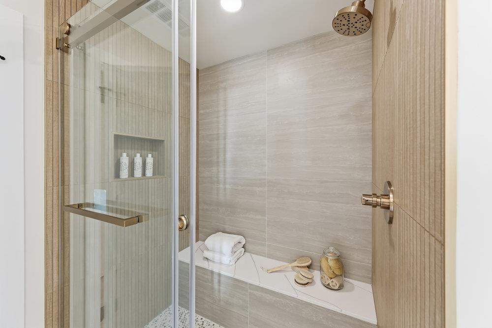 370 Burning Tree Court Half Moon Bay, CA 94019 - Photo 25 of 47 a bathroom with a sink and shower