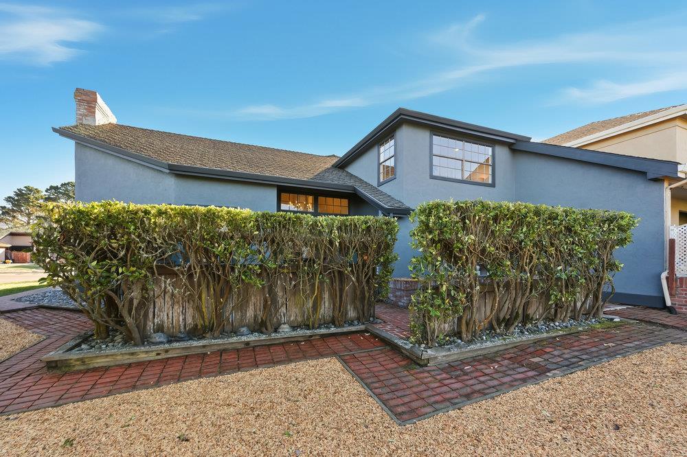 370 Burning Tree Court Half Moon Bay, CA 94019 - Photo 38 of 47 a front view of a house with garden