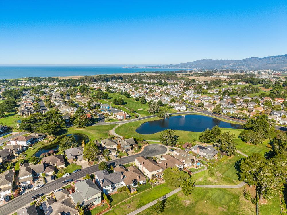 370 Burning Tree Court Half Moon Bay, CA 94019 - Photo 44 of 47 an aerial view of residential houses with outdoor space