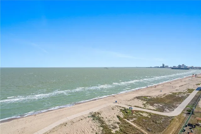 a view of a lake with a big yard