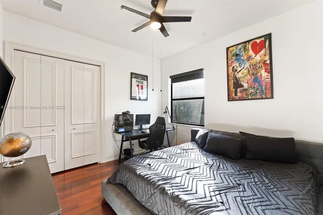 a bedroom with a bed and furniture