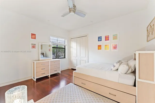 a room with a bed and a window