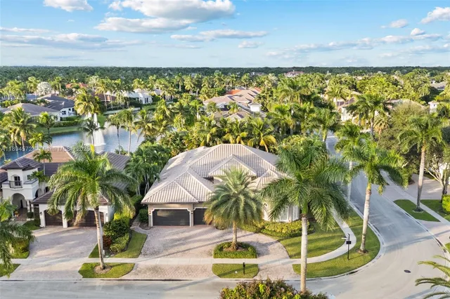 a view of swimming pool with outdoor seating and garden