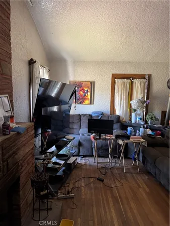 a stove top oven sitting inside of a kitchen