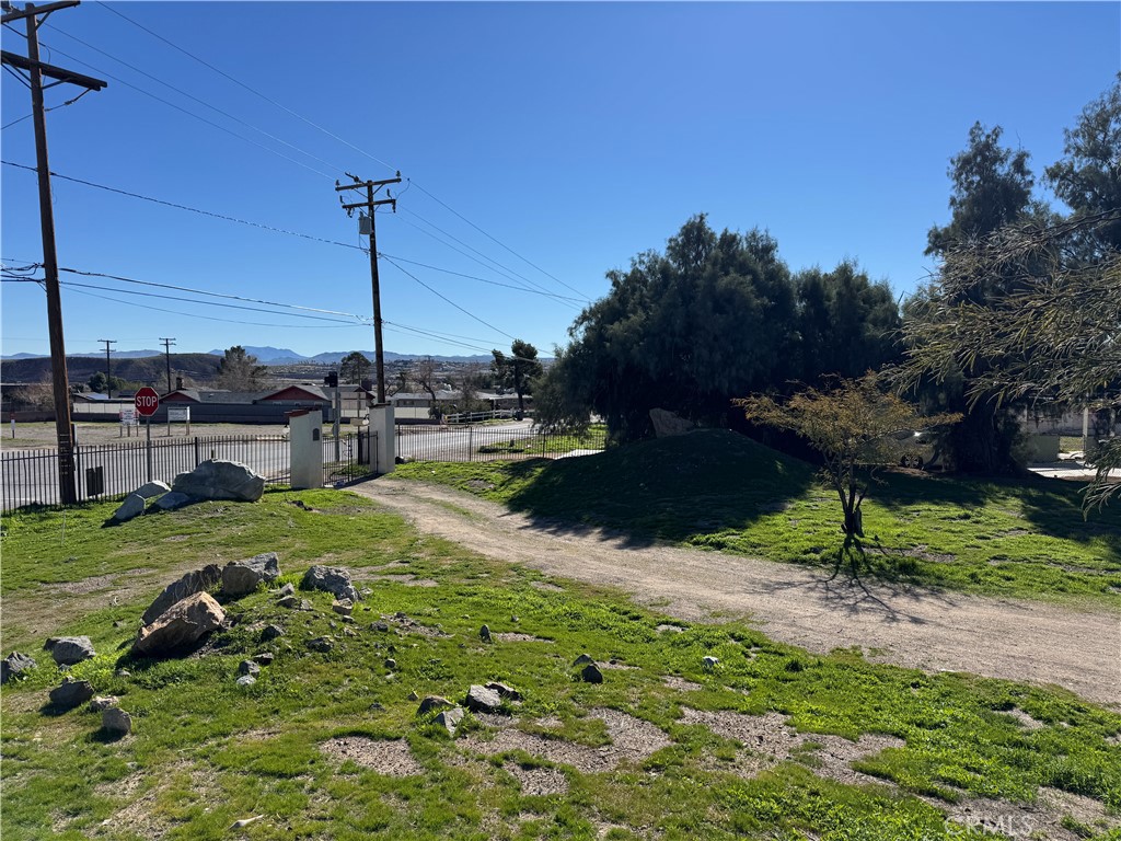 36708 Irwin Road Barstow, CA 92311 - Photo 4 of 16 a view of a garden with a tree