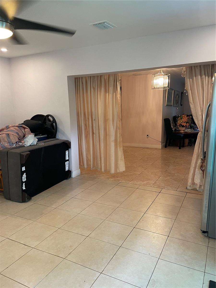 14521 Northwest 16th Court Miami, FL 33167 - Photo 4 of 6 a room with a cabinets and appliances