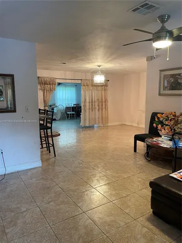 a lobby with furniture and furniture