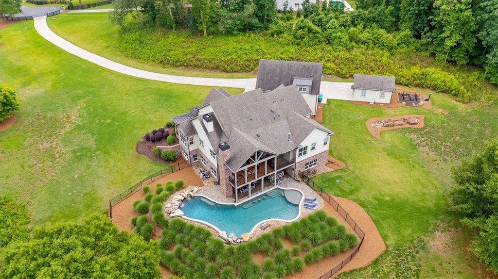 2503 Sugar Pike Road Canton, GA 30115 - Photo 20 of 134 an aerial view of a house with outdoor space pool seating area and yard