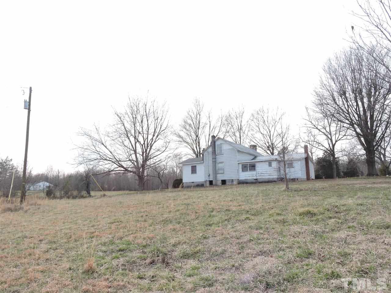8320 Bacon Road Timberlake, NC 27583 - Photo 12 of 21 a big house with a big yard