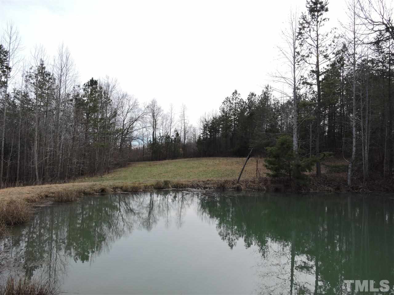 8320 Bacon Road Timberlake, NC 27583 - Photo 14 of 21 a view of lake with a yard