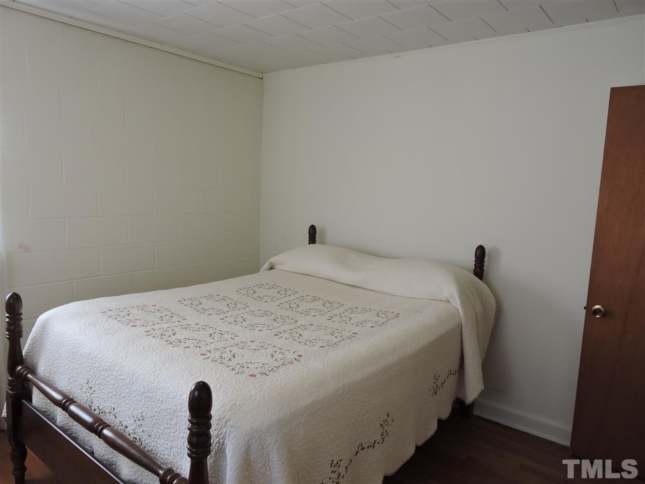8320 Bacon Road Timberlake, NC 27583 - Photo 21 of 21 a bedroom with a bed and a window