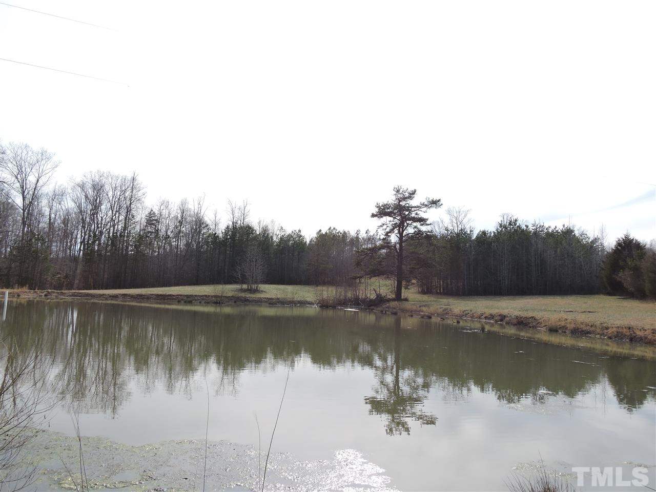 8320 Bacon Road Timberlake, NC 27583 - Photo 5 of 21 a view of lake with green space