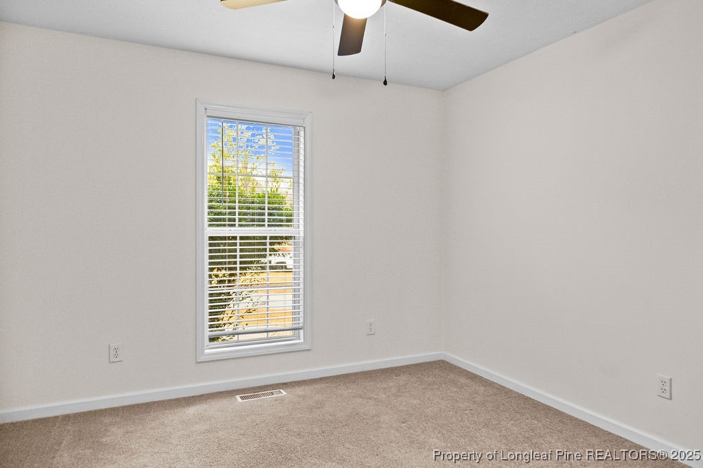 330 Fox Run Road Pinehurst, NC 28374 - Photo 17 of 31 an empty room with a window